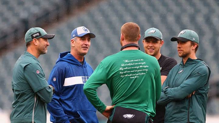 PHILADELPHIA, PA - SEPTEMBER 23: (L-R) Offensive Coordinator Mike Groh of the Philadelphia Eagles, head coach Frank Reich of the Indianapolis Colts, quarterback Carson Wentz #11, quarterback Nate Sudfeld #7 and quarterback Nick Foles #9 of the Philadelphia Eagles talk before the game at Lincoln Financial Field on September 23, 2018 in Philadelphia, Pennsylvania. (Photo by Mitchell Leff/Getty Images)